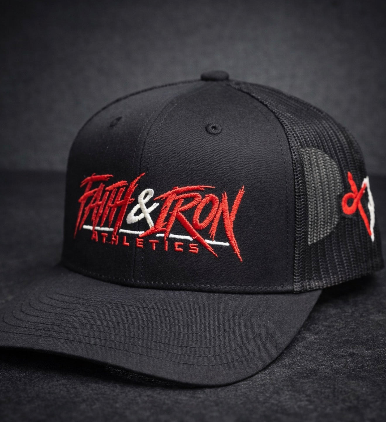 Black Snap Back Trucker hat with Black Mesh/ Red Letters